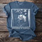 Blue t-shirt with a graphic of a surprised cat and the text "perception is violence".
