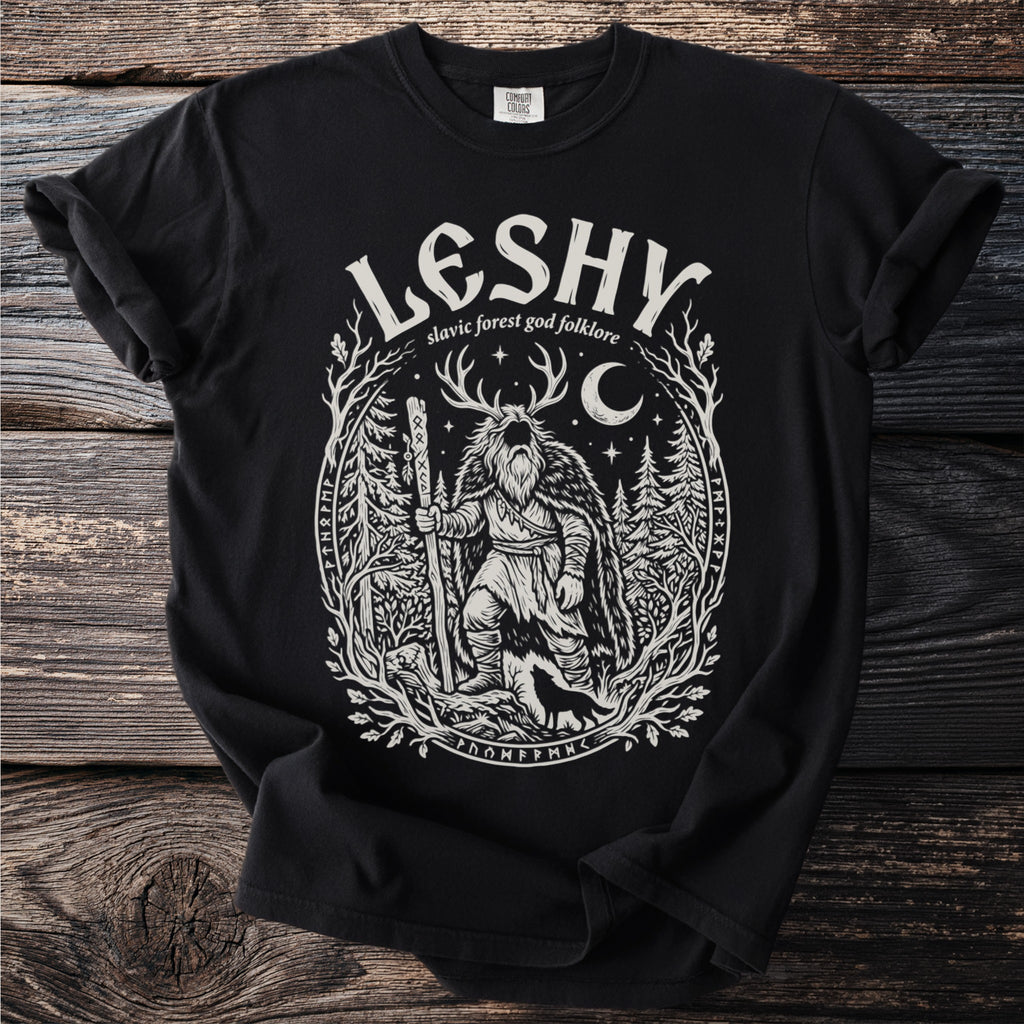 Black t-shirt with a white graphic of Leshy, Slavic forest god, within an ornate tree circle.