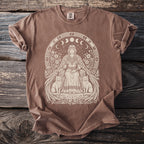 Brown t-shirt with a light beige graphic of a seated woman between two cats.