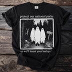 Black t-shirt with "protect our national parks or we'll haunt your backy" text and ghost graphic.