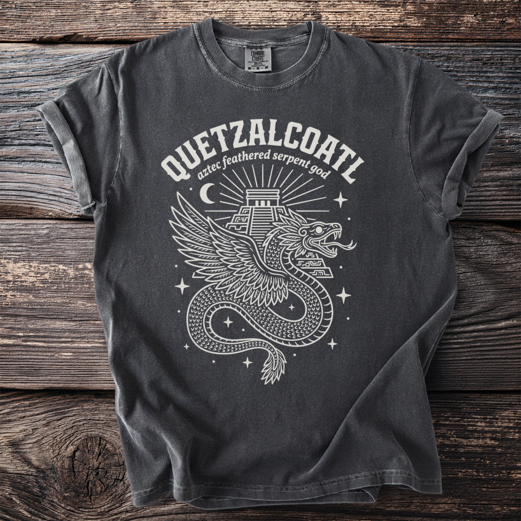 Dark grey t-shirt with white Quetzalcoatl Aztec feathered serpent god graphic.