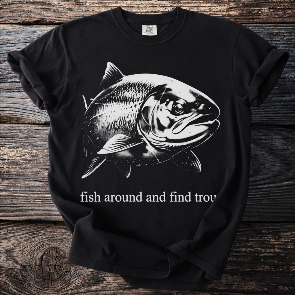 Black t-shirt with a graphic of a fish and text reading "fish around and find trou".