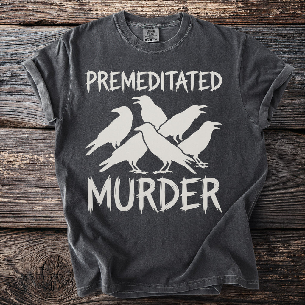 Dark gray t-shirt with white text "PREMEDITATED MURDER" and five white crows.