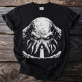 Black t-shirt with white graphic of tentacled creature and lighthouse.