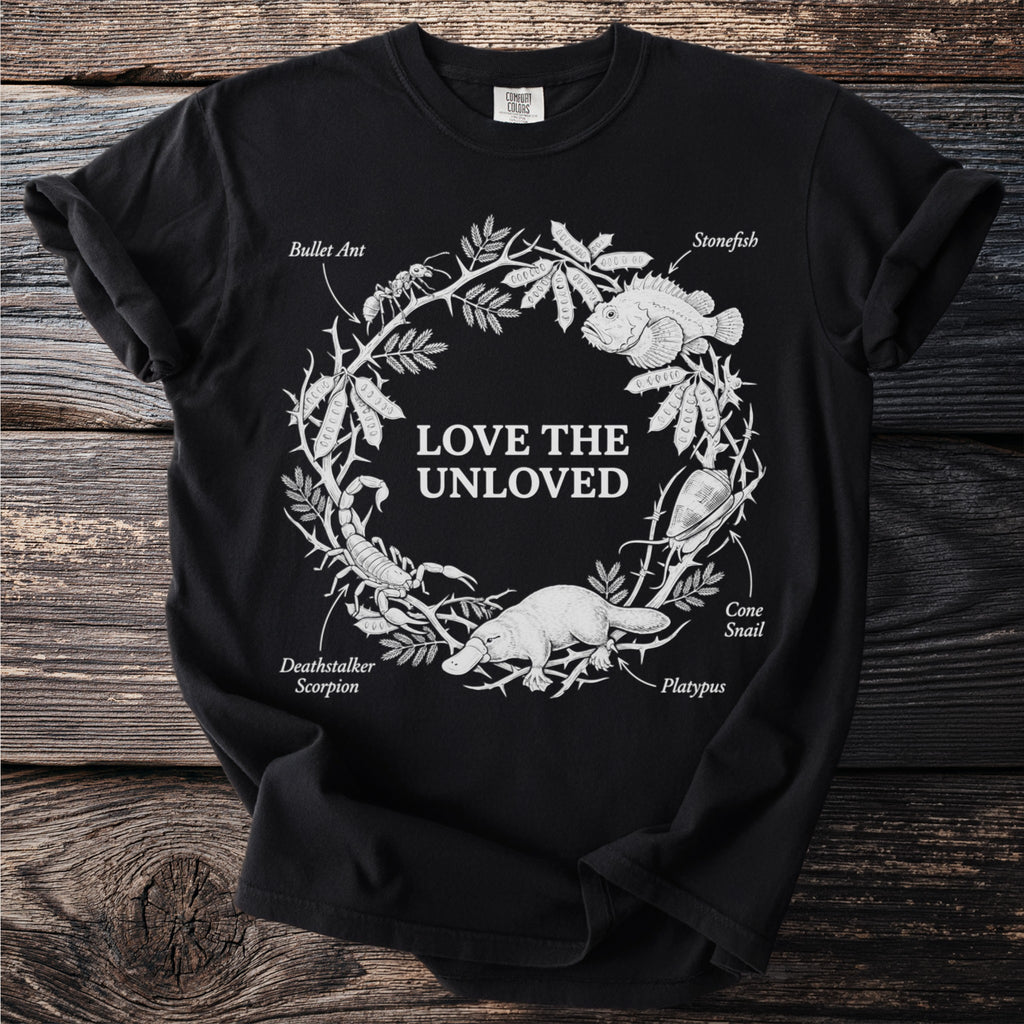 Black t-shirt with "LOVE THE UNLOVED" text surrounded by illustrations of animals.