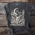 Dark grey t-shirt with a skull, antlers, raven, moon, and woodland art.