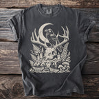 Dark grey t-shirt with a skull, antlers, raven, moon, and woodland art.