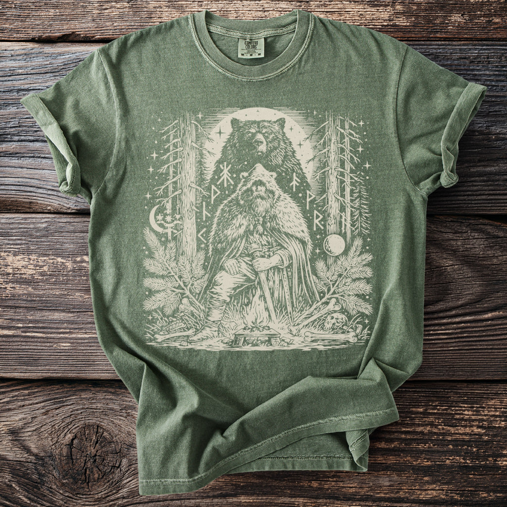 Green t-shirt with a detailed print of a Viking, bear, and forest scene.