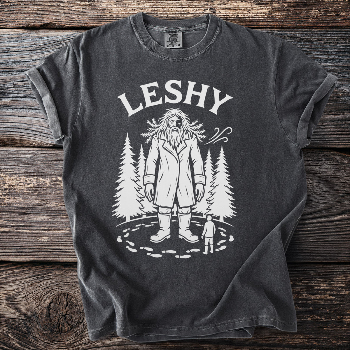 Dark grey t-shirt with white graphic featuring "LESHY" text above a woodland creature.