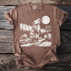 Brown t-shirt with screen print of three opossums under a full moon.