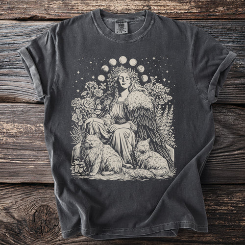 Dark grey t-shirt with line art of a woman with moon phases, cats, and flowers.