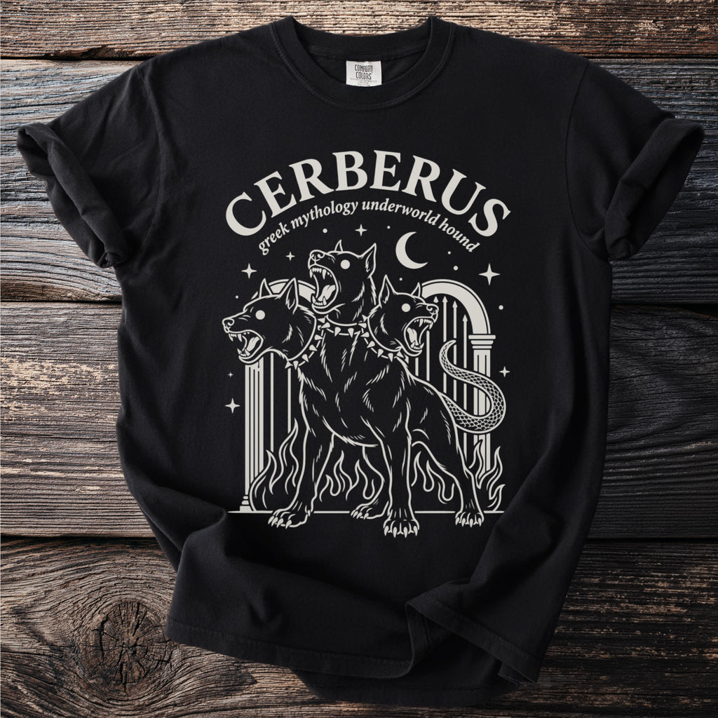 Black t-shirt with white graphic of three-headed Cerberus, greek mythology underworld hound.