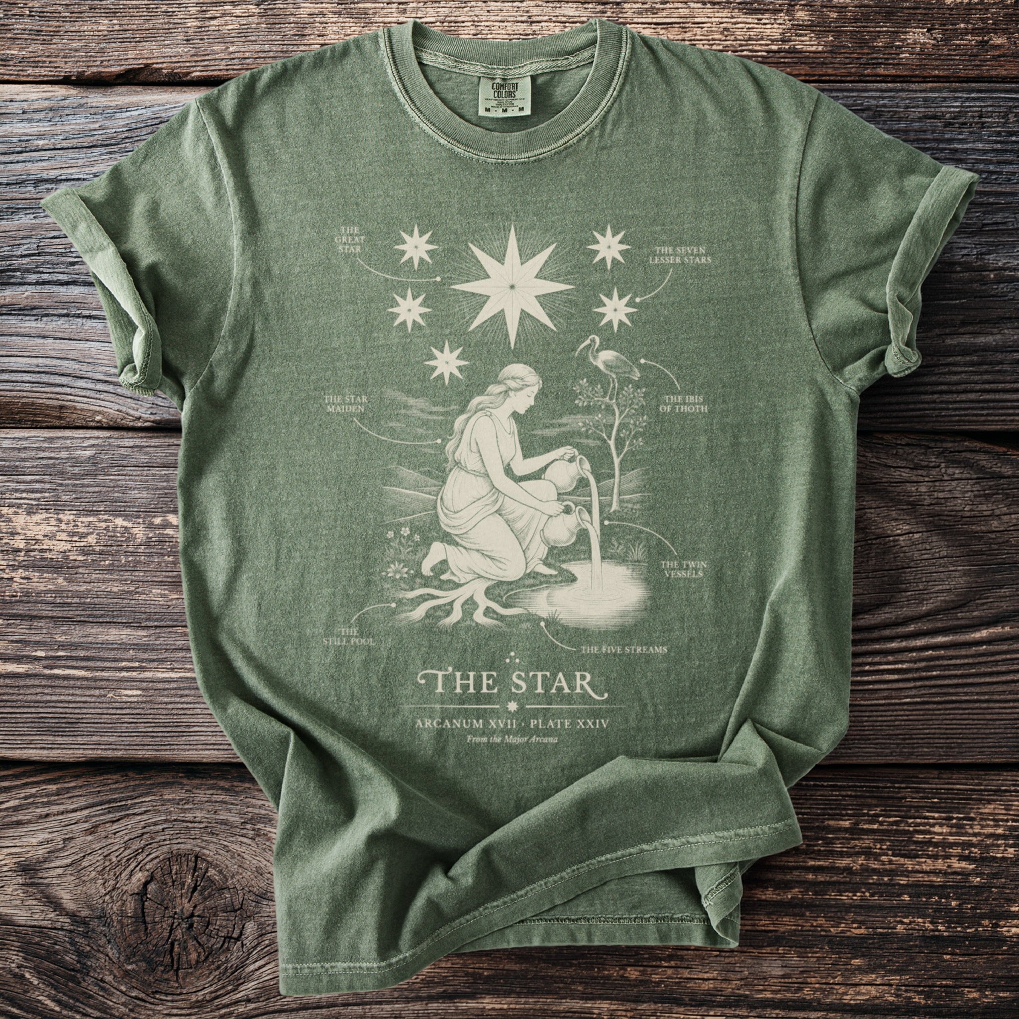 Green t-shirt with "The Star" Arcanum XVII design featuring a maiden, stars, and text.