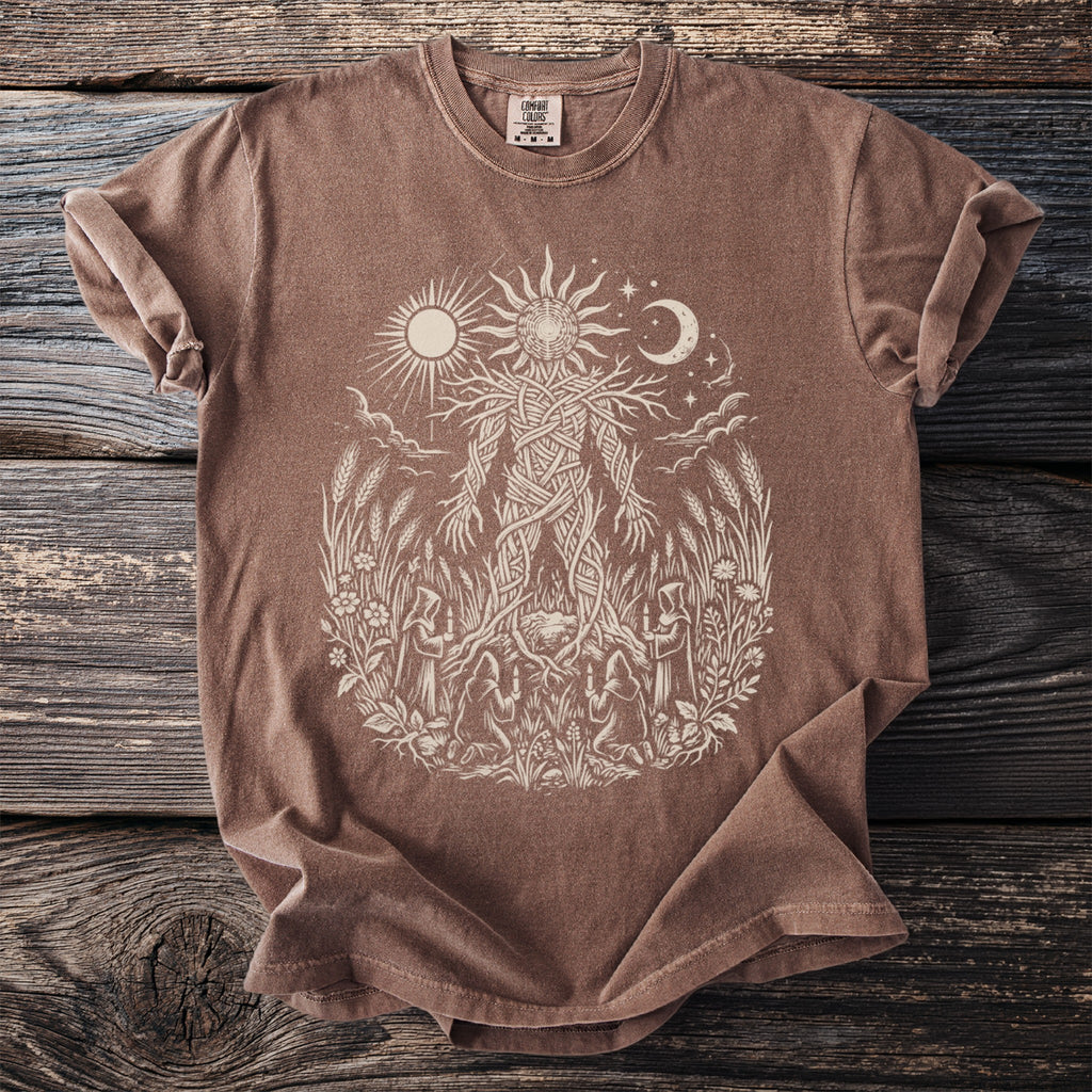 Brown t-shirt with a light tan graphic of a vine-like figure, sun, moon, and figures holding candles.