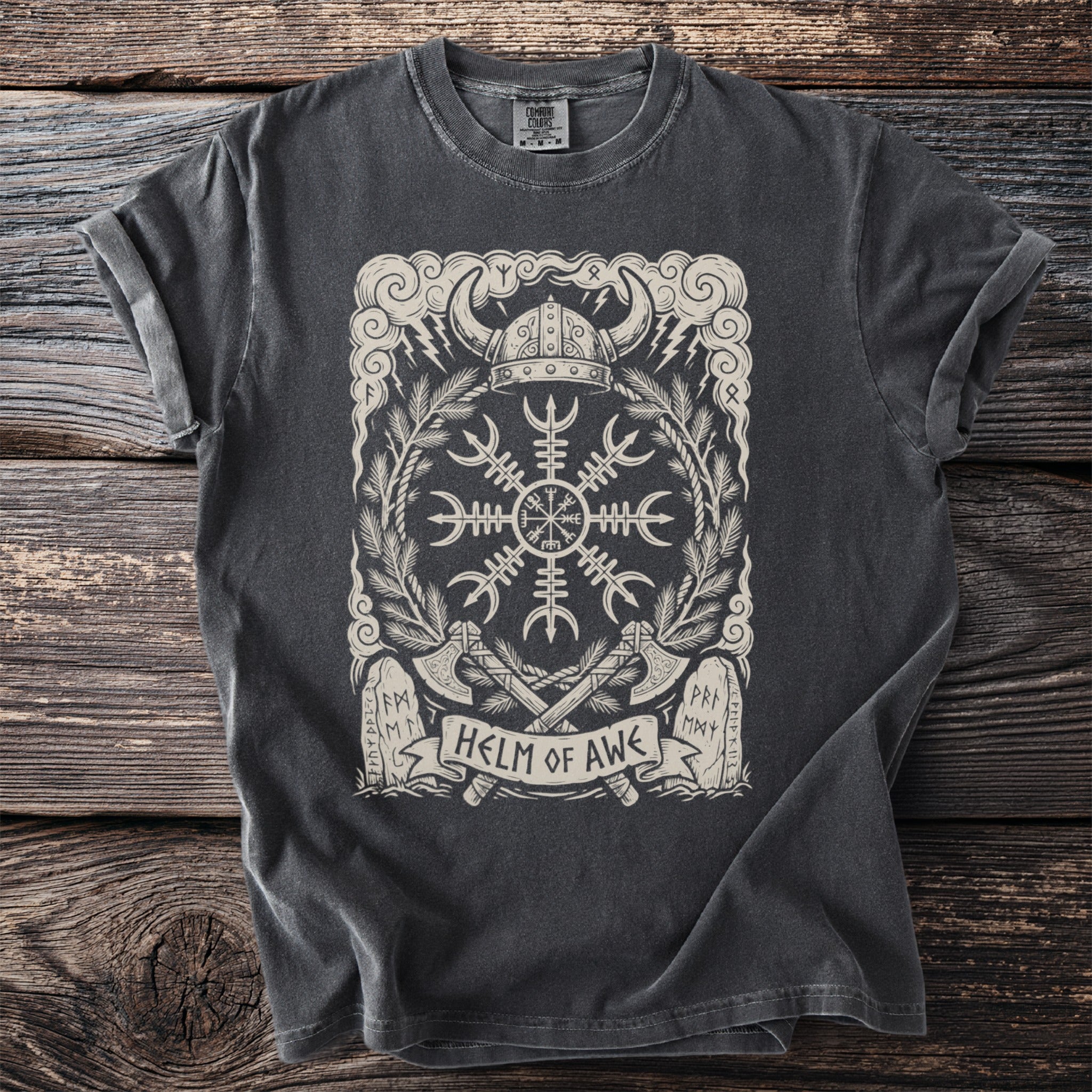 Dark t-shirt with graphic of Helm of Awe, Viking helmet, axes, and runes.