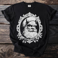 Black t-shirt with a white, ornate framed print of a menacing Santa with horns.