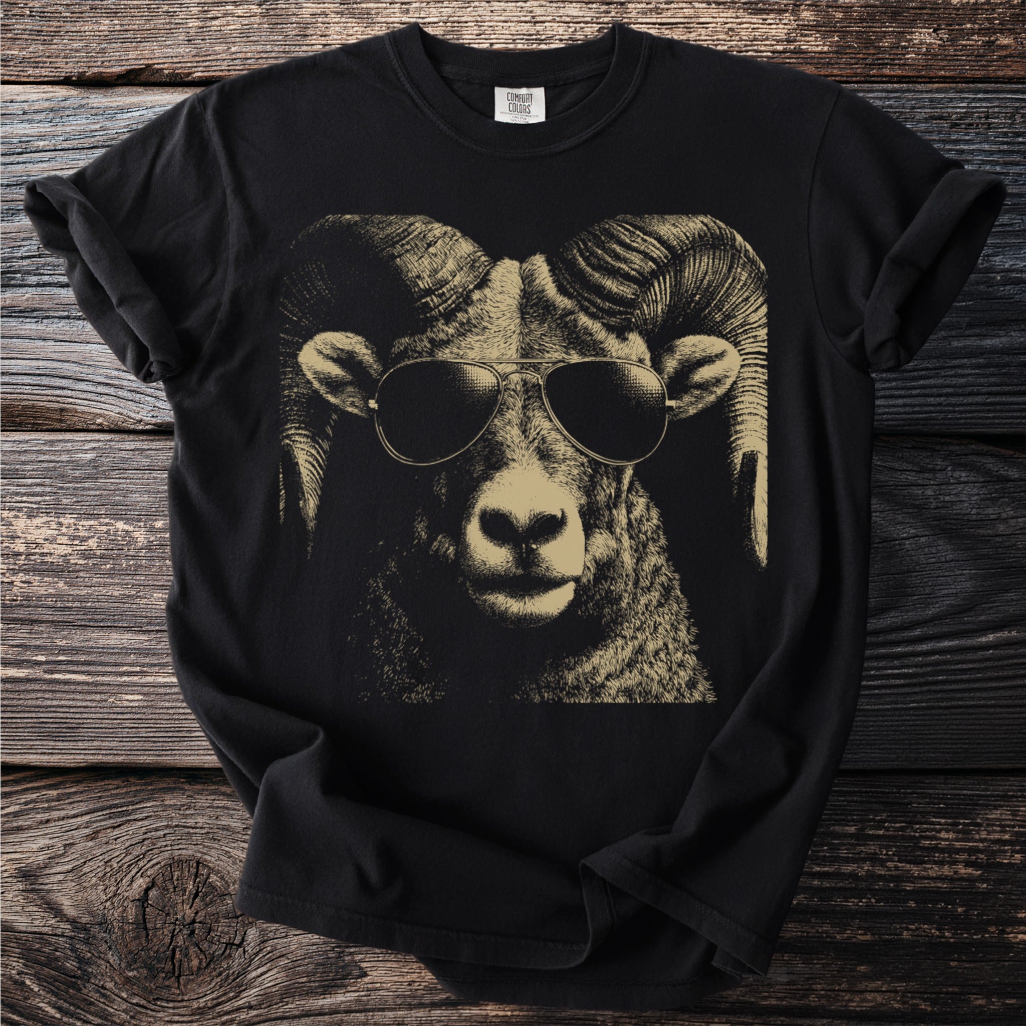 Black t-shirt with a vintage sketch of a ram wearing aviator sunglasses.