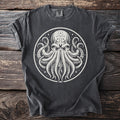 Dark gray t-shirt with a white, circular, stylized octopus graphic.