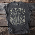 Dark gray t-shirt with a cream-colored outline of a ghost in water with reeds, dragonflies and lanterns.