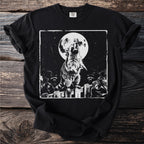 Black t-shirt with graphic of a raccoon howling at the moon on a fence.