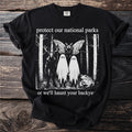 Black t-shirt with "protect our national parks" and spooky forest creatures.