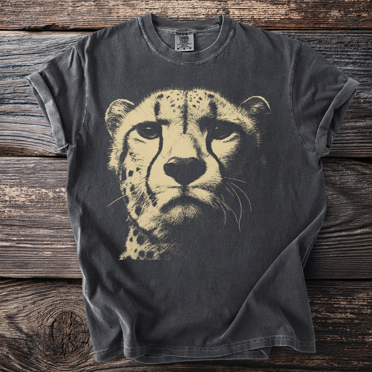 Charcoal t-shirt with a close-up graphic of a cheetah's face in tan.