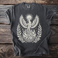 Dark grey t-shirt with a cream phoenix rising from flames and a sun graphic.