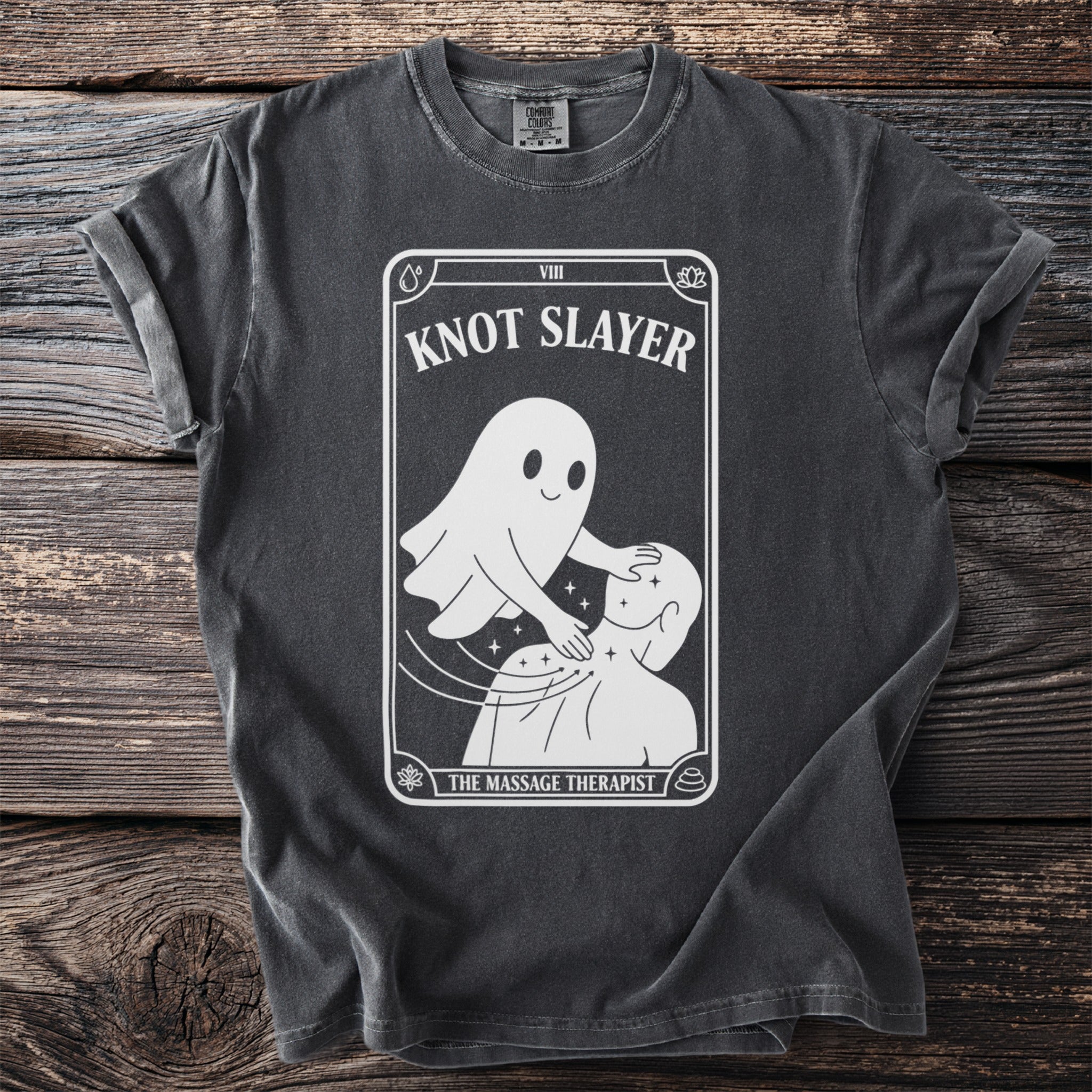 Ghost giving a massage with text "KNOT SLAYER THE MASSAGE THERAPIST" on a shirt.