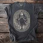Dark t-shirt with an oval design of a bearded man with staff and ravens, surrounded by runes.