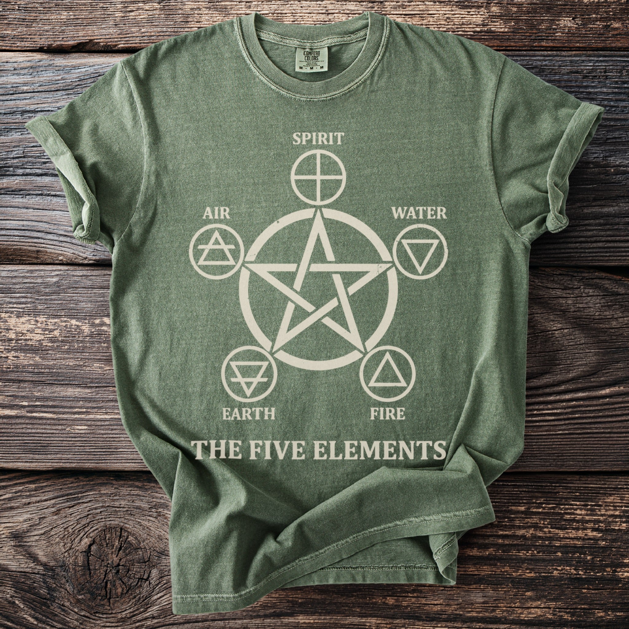Green t-shirt with a pentagram and the words "Spirit," "Air," "Water," "Earth," "Fire," and "The Five Elements."