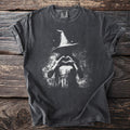 Dark t-shirt with white graphic of a witch making a heart shape with her hands.