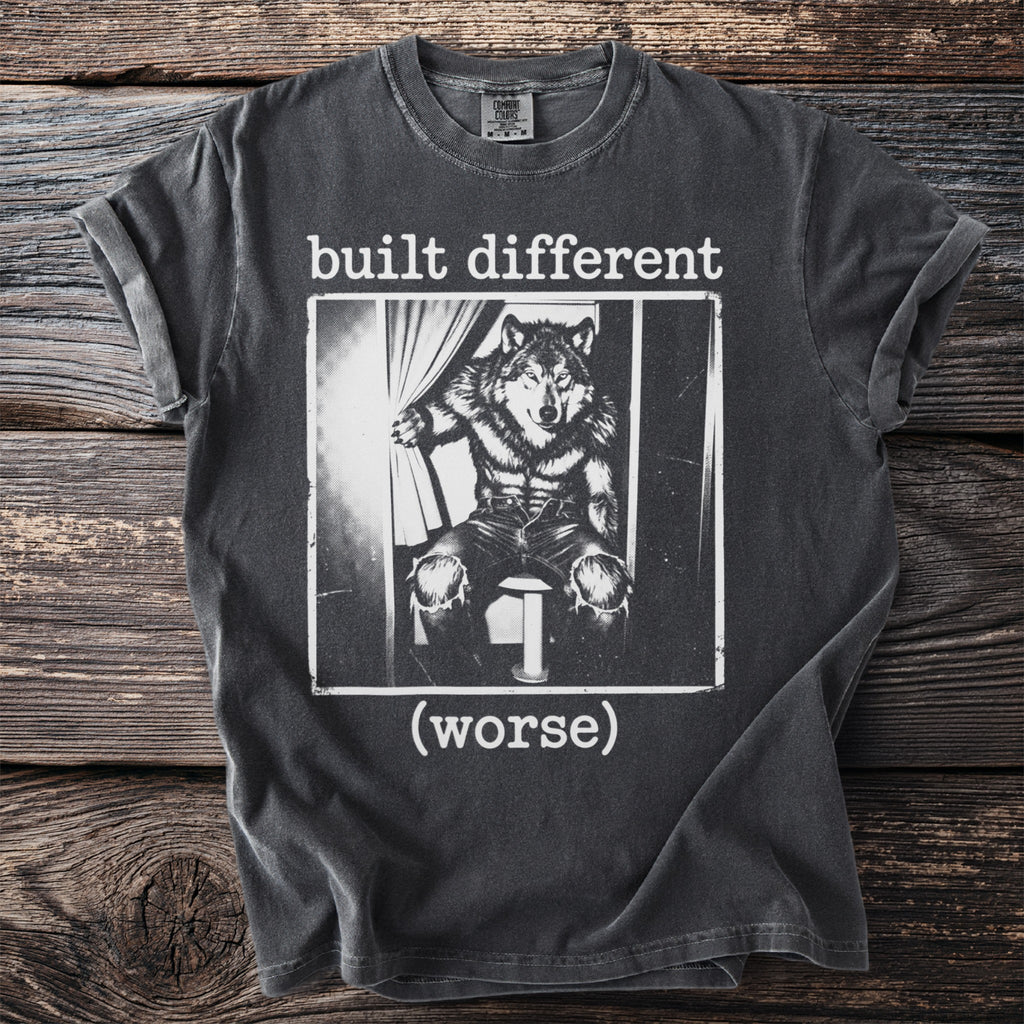 T-shirt with black and white graphic of a wolf in clothes and text "built different (worse)".