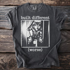 T-shirt with black and white graphic of a wolf in clothes and text "built different (worse)".