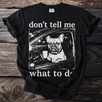 Black t-shirt with French bulldog in car holding coffee, text "don't tell me what to do".