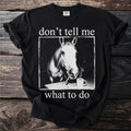 Black t-shirt with a horse smoking a cigarette and holding a coffee mug.