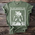 Green t-shirt with "do not perceive me" text and a werewolf graphic.