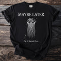 Black t-shirt with white text "Maybe Later" and a drawing of a jellyfish.