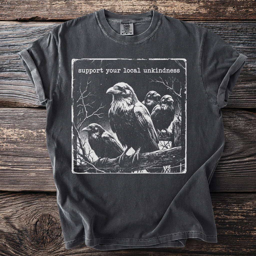 T-shirt with four ravens on a fence and the text "support your local unkindness".