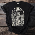 Grim reaper with scythe in a field of wheat and poppies under the moon.