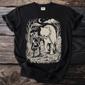 Viking with axe confronting chained wolf in a graveyard under a moonlit sky.