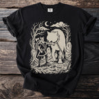 Viking with axe confronting chained wolf in a graveyard under a moonlit sky.