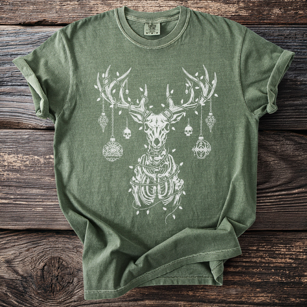 Green t-shirt with a white skeleton reindeer adorned with ornaments and lights.