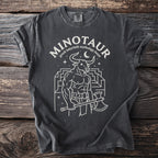 Dark grey t-shirt with white graphic of a muscular minotaur holding an axe and labyrinth.