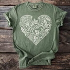 Green t-shirt with a white bat and floral heart design