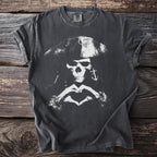 Dark t-shirt with distressed white pirate skull, anchor earring, and heart hands graphic.