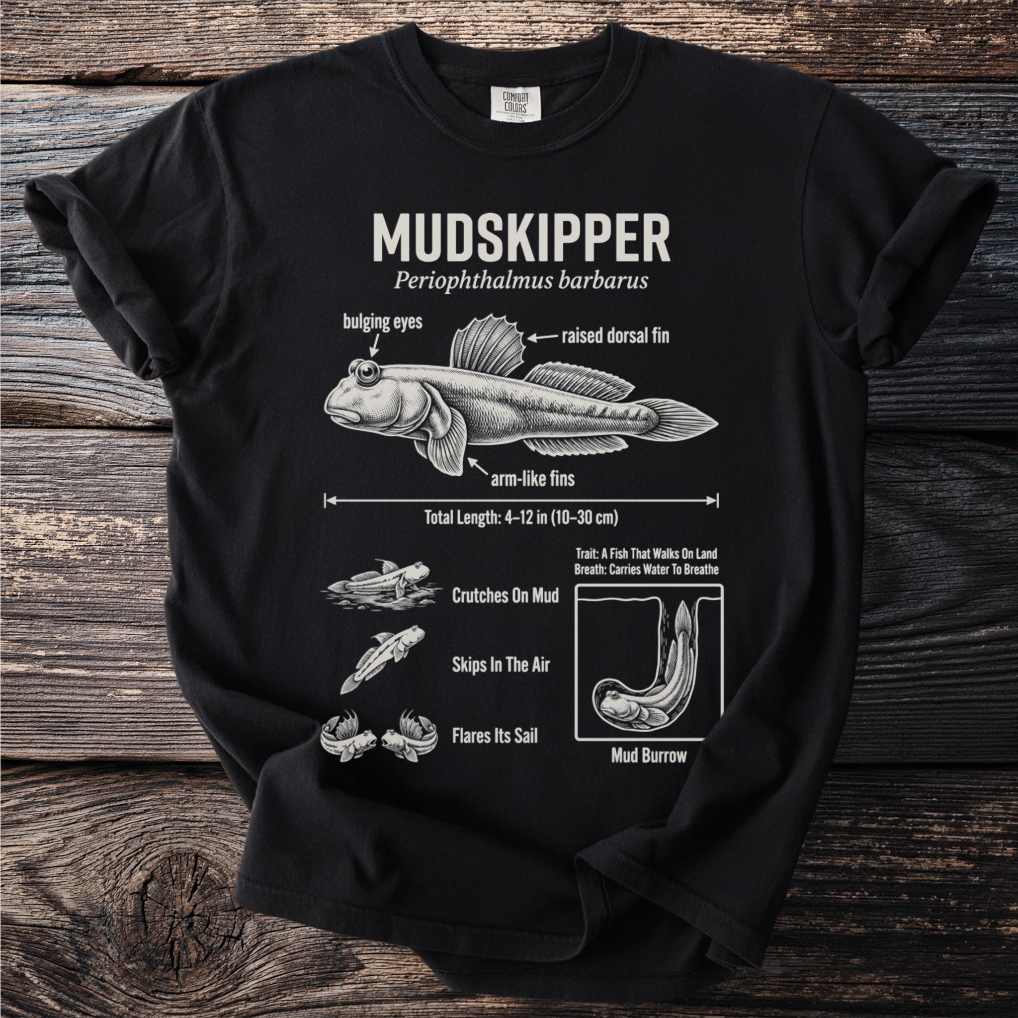 Black t-shirt with illustration and text about the Mudskipper fish.