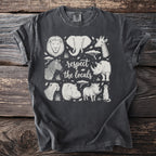 T-shirt featuring a line drawing of African animals and the text "respect the locals"
