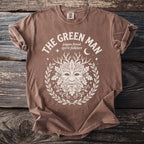 Brown t-shirt with white "The Green Man" graphic and pagan folklore symbols.