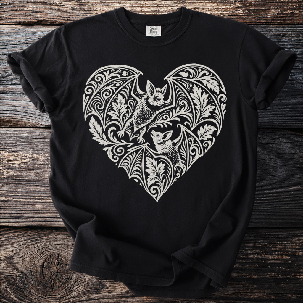 Black t-shirt with ornamental heart design featuring two bats.
