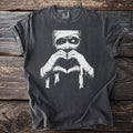 T-shirt with white mummy graphic making a heart shape with bandaged hands